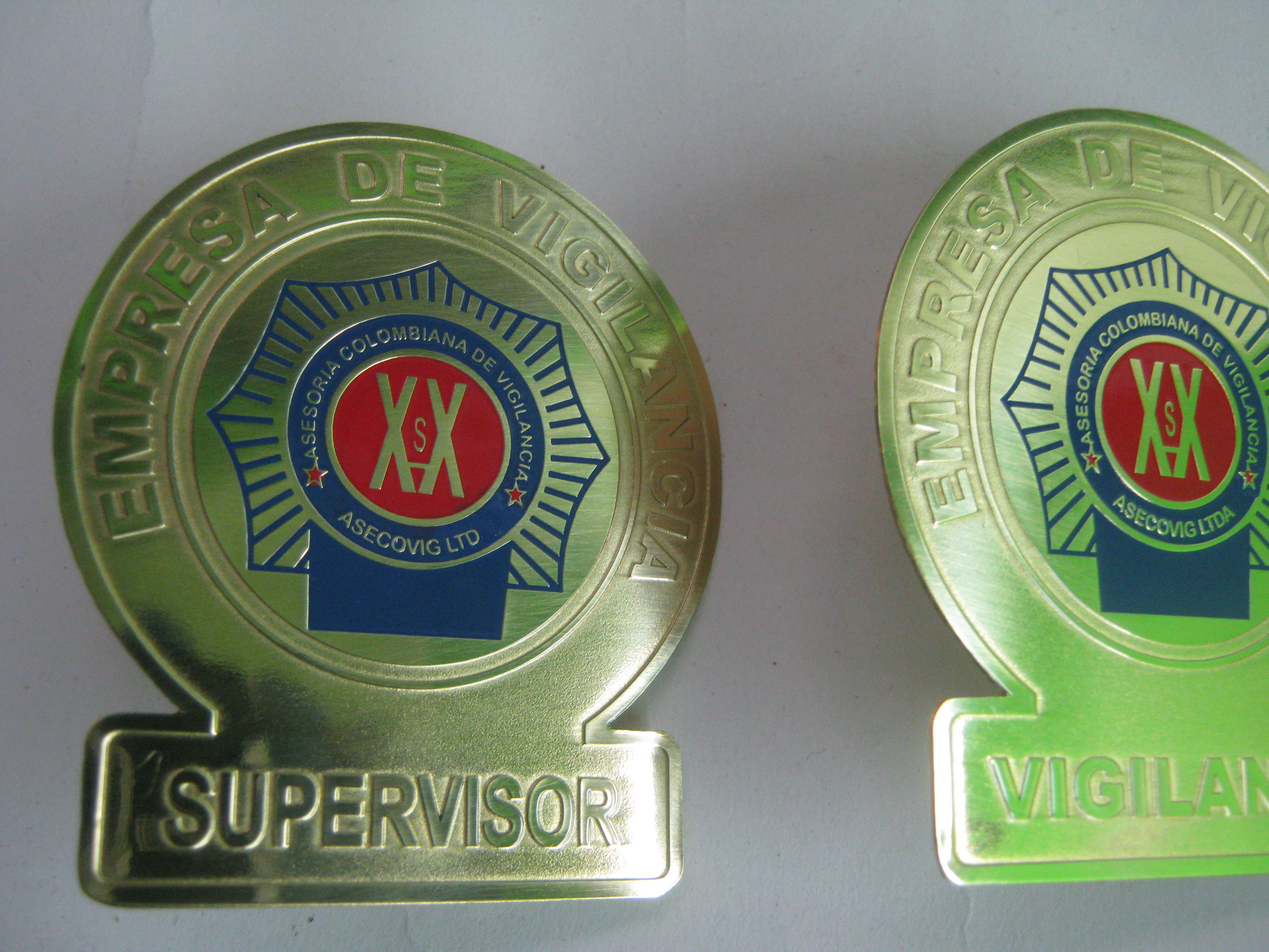 PLACA  VIGILANTE , ASECOVIG, AMA JOYERIA CORPORATIVA